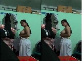 After-sex cute-looking girl still wearing her clothes