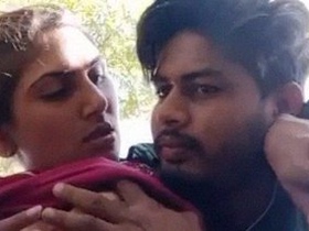Pair of lovers indulge in boob fondling and pressing in a steamy video