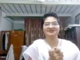 Watch a PK housewife and her lover engage in a live cam show