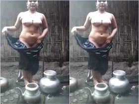 Pakistani bhabha takes a bath and masturbates