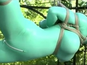 BDSM mistress dominates submissive in public