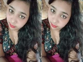 Lovely girl flaunts her breasts and vagina