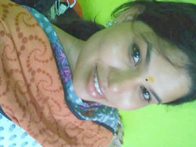 Watch a hot desi babe in a salwar top masturbate with her boobs and pussy