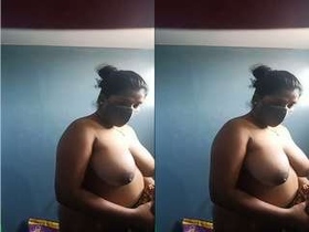 Tamil wife seductively performs a tango in a hot video