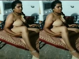 Watch a Tamil wife strip and perform live on camera