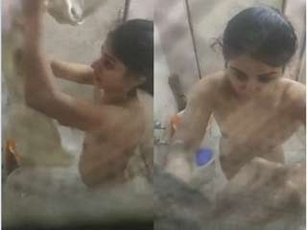 Cute girl films herself taking a bath on camera