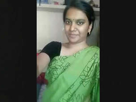Busty bhabhi flaunts her assets in a seductive display