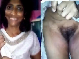 Indian housewife shows off her big tits and pussy
