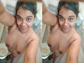 A stunning girl captures intimate selfies for her partner