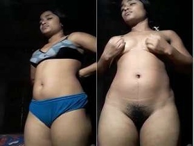 Watch a stunning Indian babe pleasure herself with body oil