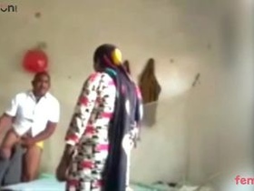 Desi man has sex with a woman in the missionary position on the bed