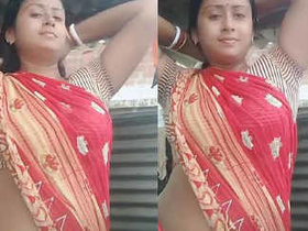 Naughty hijab girl strips down and has fun with black lover on bed in video