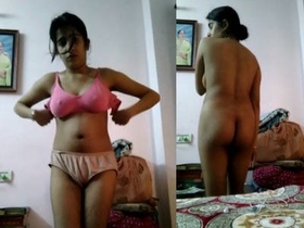 A hot European girl records a video of herself for her friend