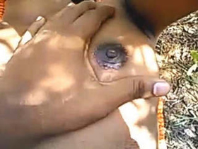 Telugu girl masturbates and fucks in the outdoors