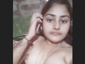 Watch a super cute teen rubbing her shaved pussy in this sexy video