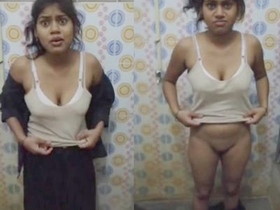 Cute desi girl takes a bath in the bathroom