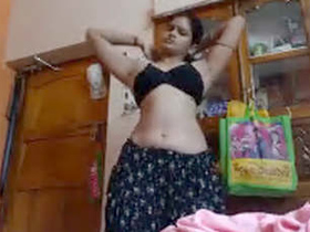 Young girl pleasures herself with her hands in explicit video
