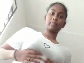 Tamil hottie strips naked and pleasures her natural pussy