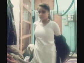 Cute college girl shows off for her boyfriend in Hindi video