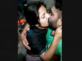 Adorable couple shares a sweet kiss in a romantic video