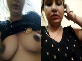 Desi Bhabha's sultry gaze and ample bosom in a steamy video