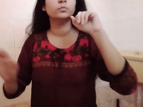 Long-haired bhabhi gets naked for bathing in a video clip