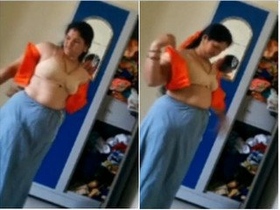 Busty Indian wife undresses and shows off her curves
