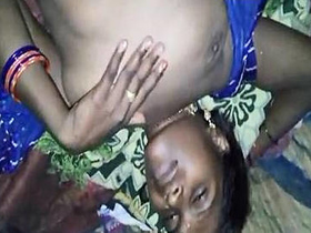 A mature Desi woman lubes up her pussy with cream