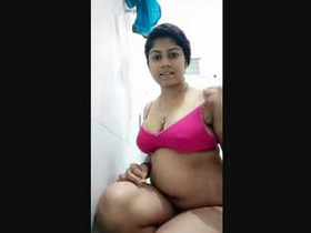 Naughty girl films herself masturbating in front of the camera