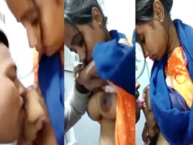 Office manager gives boob job to staff member in secret video