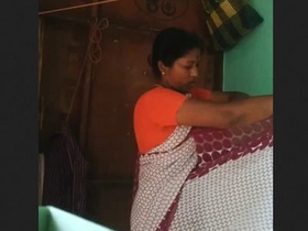 Mature woman records herself in the process of changing