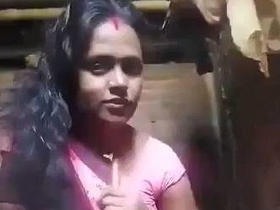 Indian Telugu woman masturbates with dildo