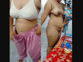 Desi wife's clothes after sex caught on camera