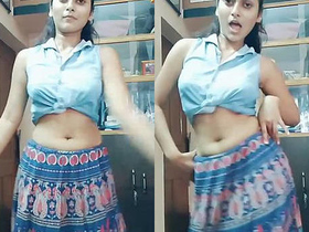 Indian girl seductively moves in a dance video