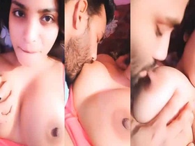 A cute amateur girlfriend and her Indian partner perform a sexual show