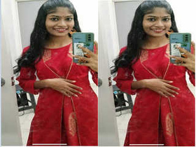 Busty Indian babe gives a titjob to her boyfriend