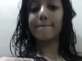 Desi beauty strips naked in the bathroom and masturbates