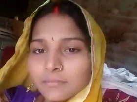 Busty Indian woman Dehati strips and shows off her wet pussy in solo video