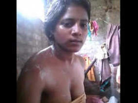 College girl gets naked in a bathtub