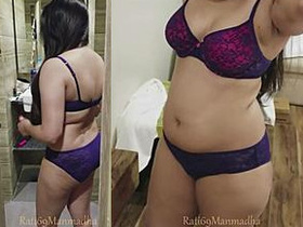 Rati, the hot Indian wife, grooming her hair while walking around