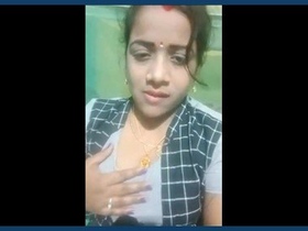 Watch a stunning Indian bhabhi flaunt her body and pussy in a steamy video