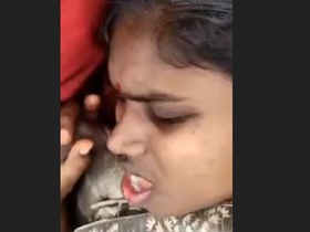 Indian hotwife moans in pleasure during threesome