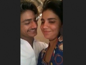 A passionate kiss between a Pathani couple in the great outdoors