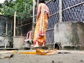Naked Desi takes a bath in a bathtub with a view of the village