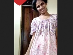 Cute Indian girl bares her breasts and intimate area