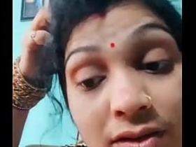 A cute desi bhabi from a village flaunts her pussy on camera