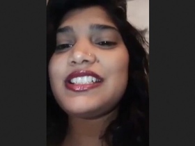 Exhibiting her breasts and vagina for pleasure