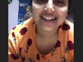 The cute girl flaunts her massive breasts