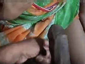 Indian bhabi gives a handjob and gets a cum on her tits