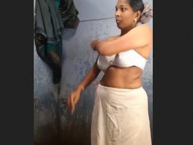 Desi Bhabhi in Dress: A Sensual Video
